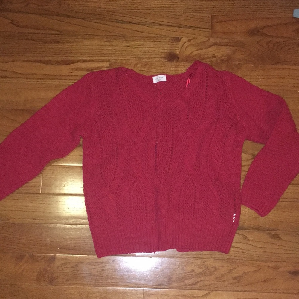 Red sweater.